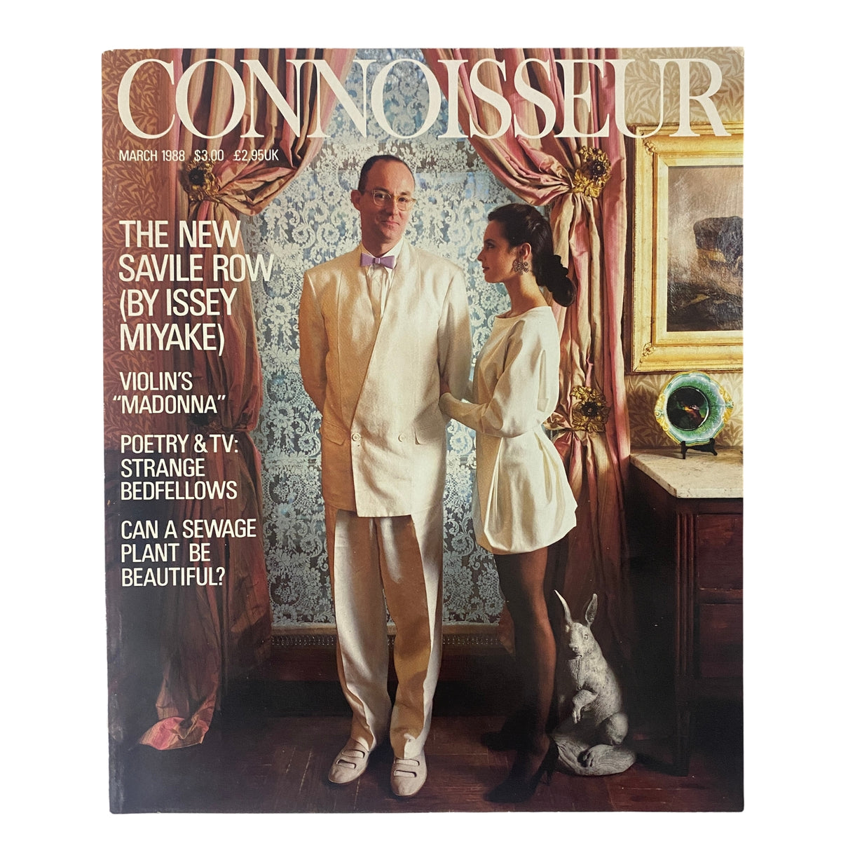 Cover of Connoisseur Magazine March 1988 showcasing 'The New Savile Row by Issey Miyake', featuring a man and woman in stylish outfits against an elegant backdrop, highlighting the intersection of fashion and cultural commentary.