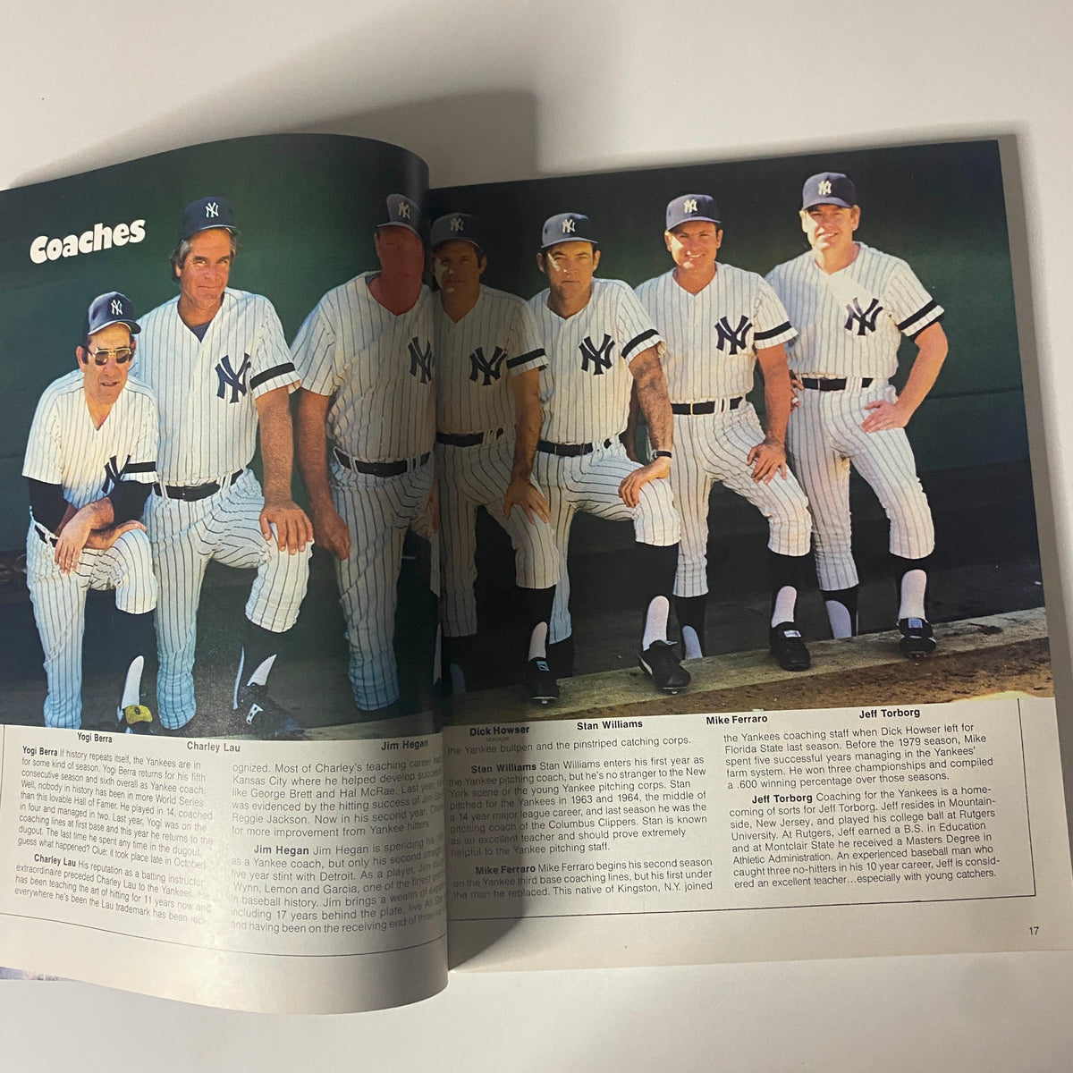 Coaching staff page from the 1980 New York Yankees Yearbook 'Dawning of a Decade' showcasing Yankees coaches in their uniforms.