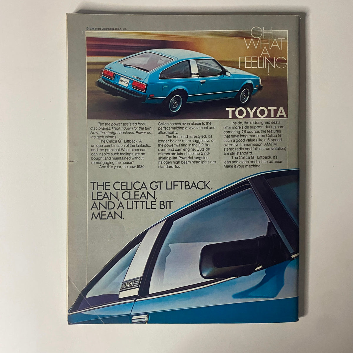 1980 New York Yankees Yearbook Dawning of a Decade with a vintage advertisement for the Toyota Celica GT Liftback, reflecting the era's automotive style.