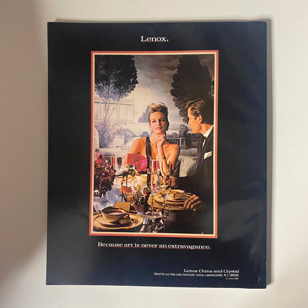 Connoisseur Magazine June 1986 Dream Wedding in Paris includes an elegant advertisement for Lenox, featuring a luxurious dining setting with a stylish couple, emphasizing sophistication in dinnerware and decor.