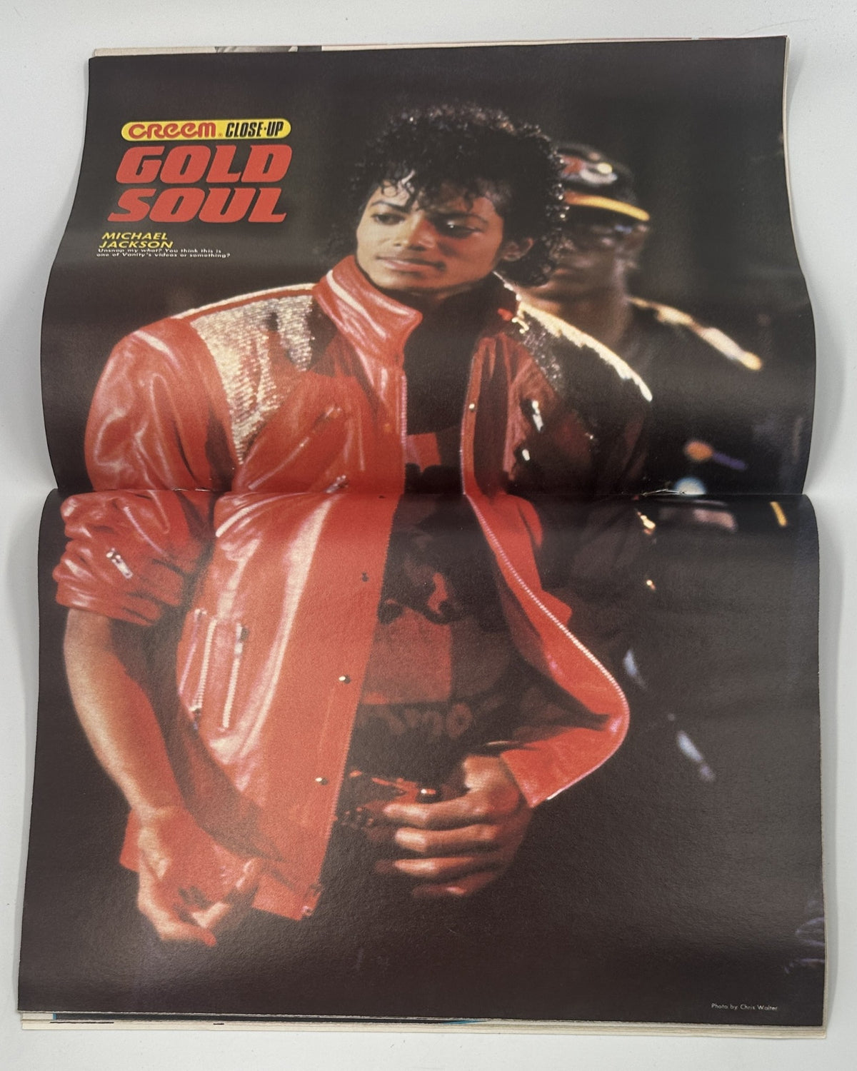 Centerfold of Creem Close-Up Magazine January 1984 showcasing a striking image of Michael Jackson in a red leather jacket, highlighting his iconic style.