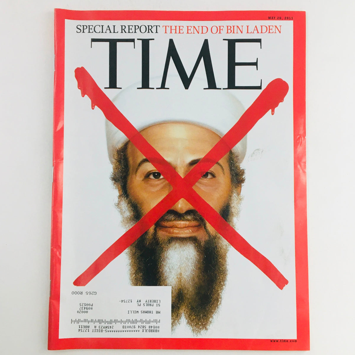 Time Magazine cover from May 20, 2011, titled 'The End of Osama Bin Laden', featuring a striking red 'X' over the image of Osama Bin Laden, symbolizing his demise.