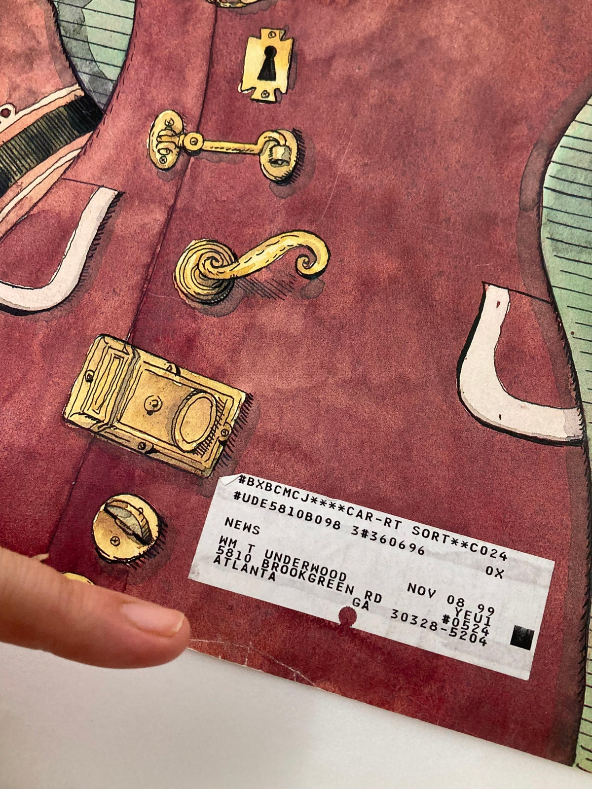 Close-up of The New Yorker cover dated November 17, 1997, 'Locked Up' by Barry Blitt, emphasizing intricate details of locks and textures on the coat of the character.