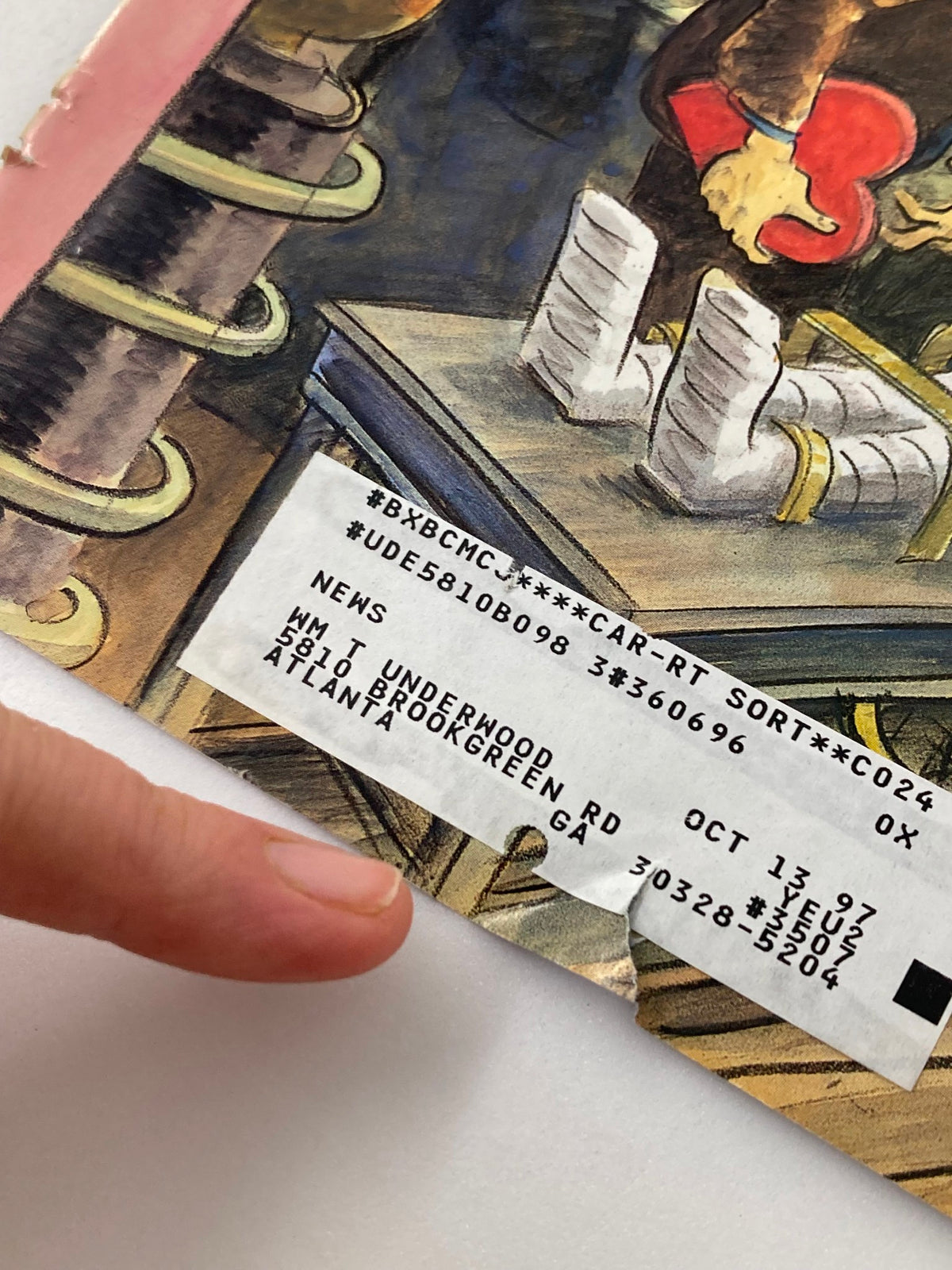 Close-up view of the front cover of The New Yorker magazine, February 17, 1997, showcasing the original price tag and details of the magazine featuring 'Ghouls Rush In' artwork by Edward Sorel.
