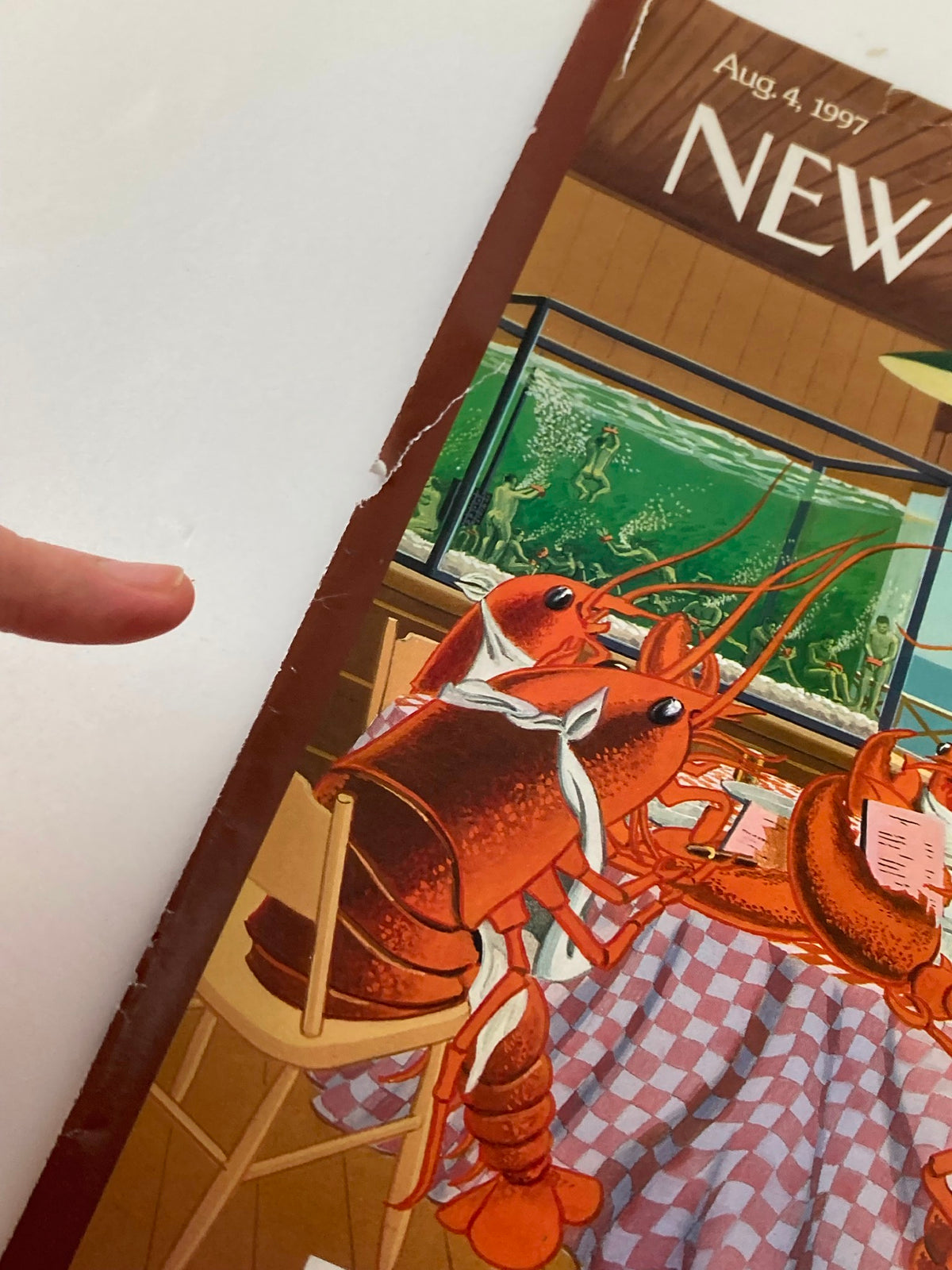 Edge view of The New Yorker cover, August 4, 1997, titled 'Lobsterman's Special' by Bruce McCall, focusing on lobsters enjoying a meal and illustrated details of the cover.