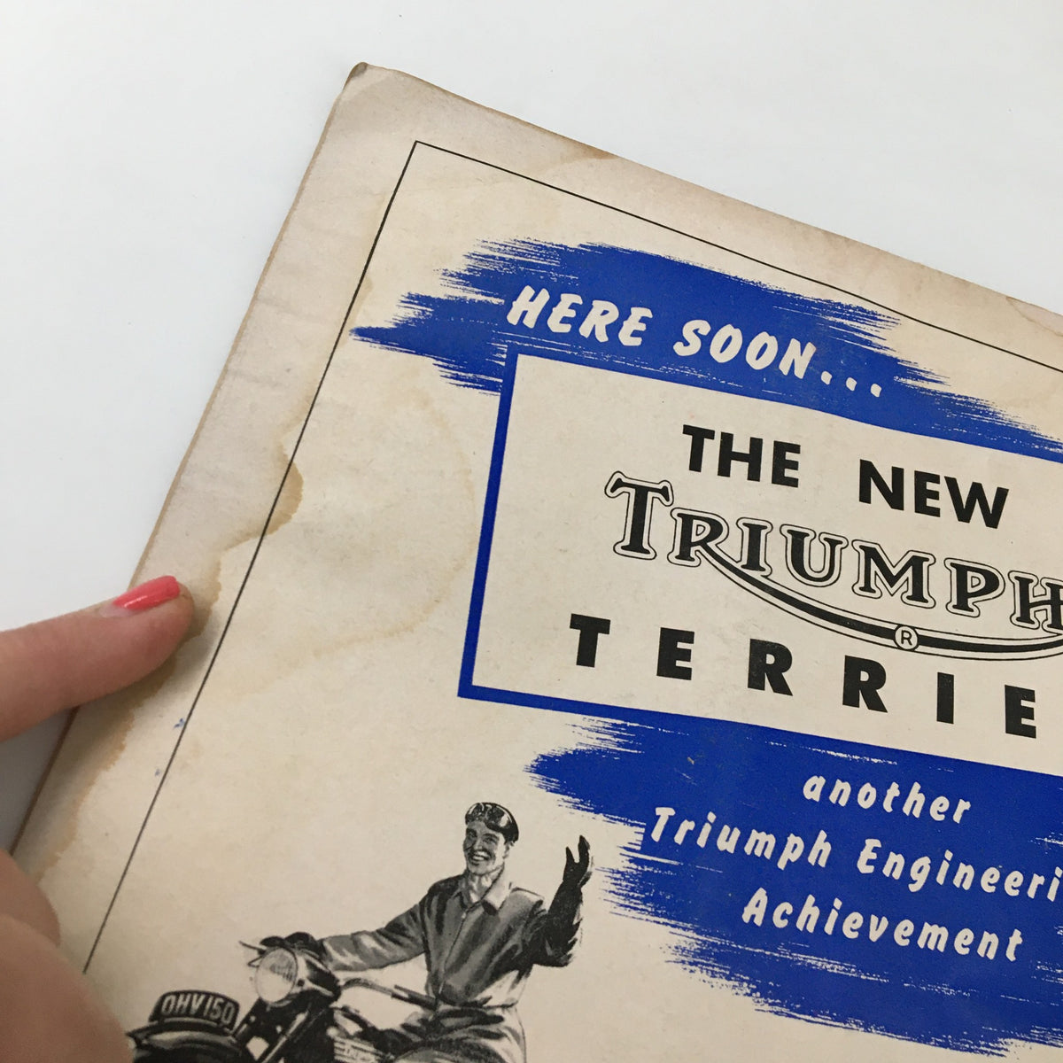 Back cover of the VTG Cycle Magazine October 1953 displaying an advertisement for the new Triumph Terrier motorcycle, featuring a vintage illustration and promotional text.