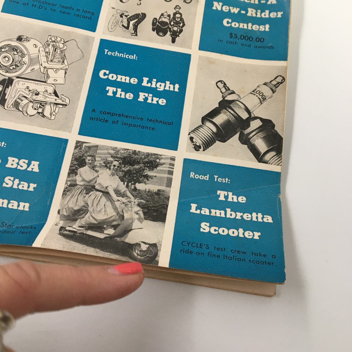 Close-up of the September 1955 Cycle Magazine revealing features such as 'Come Light the Fire' technical article and a road test review of the Lambretta scooter. Part of the issue 'VTG Cycle Magazine September 1955 Joe Leonard Wins Windber Road Race'.