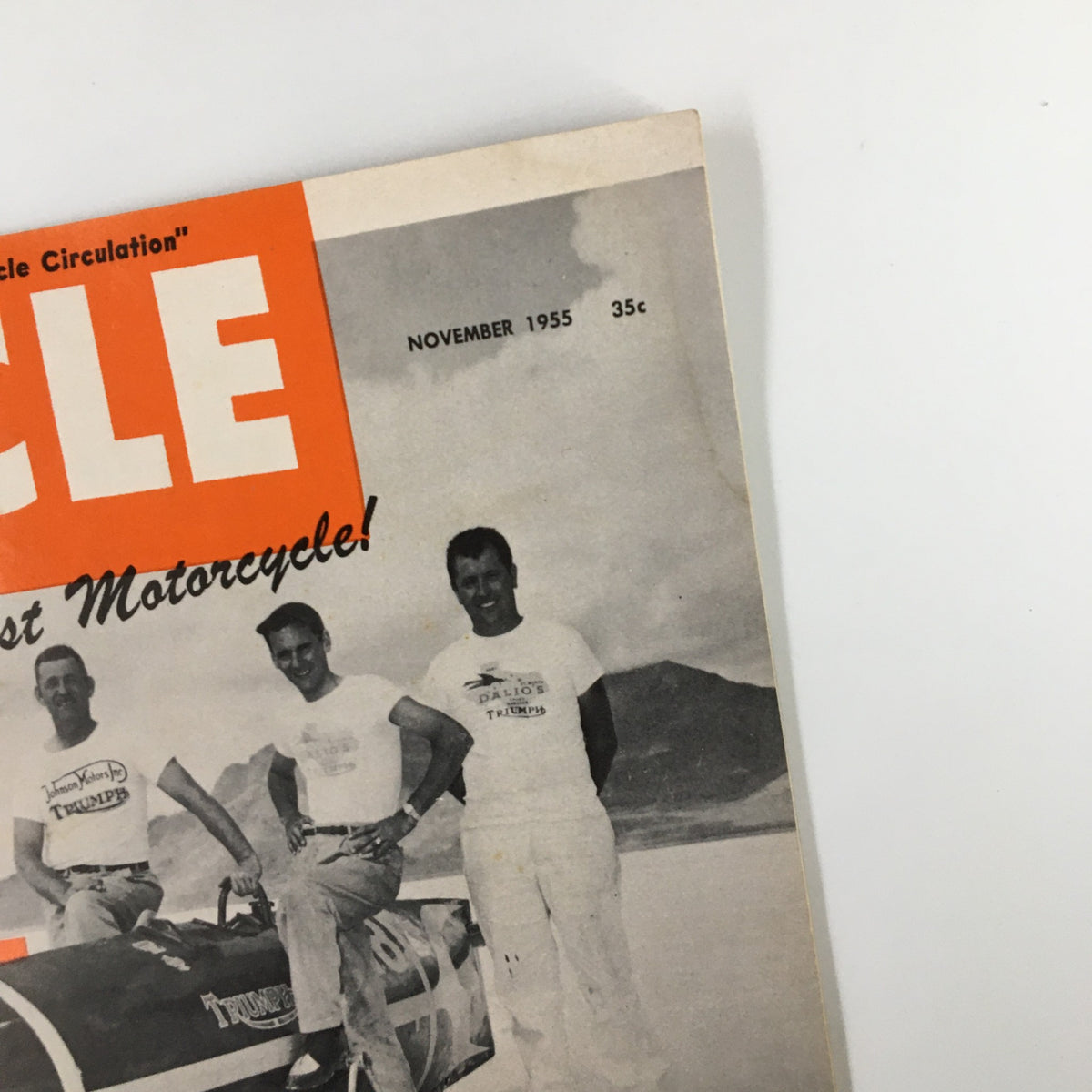 Close-up view of the VTG Cycle Magazine November 1955 cover showcasing Johnny Allen with record-breaking Triumphs. The magazine emphasizes the title 'World's Fastest Motorcycle!' and features the month and year prominently.
