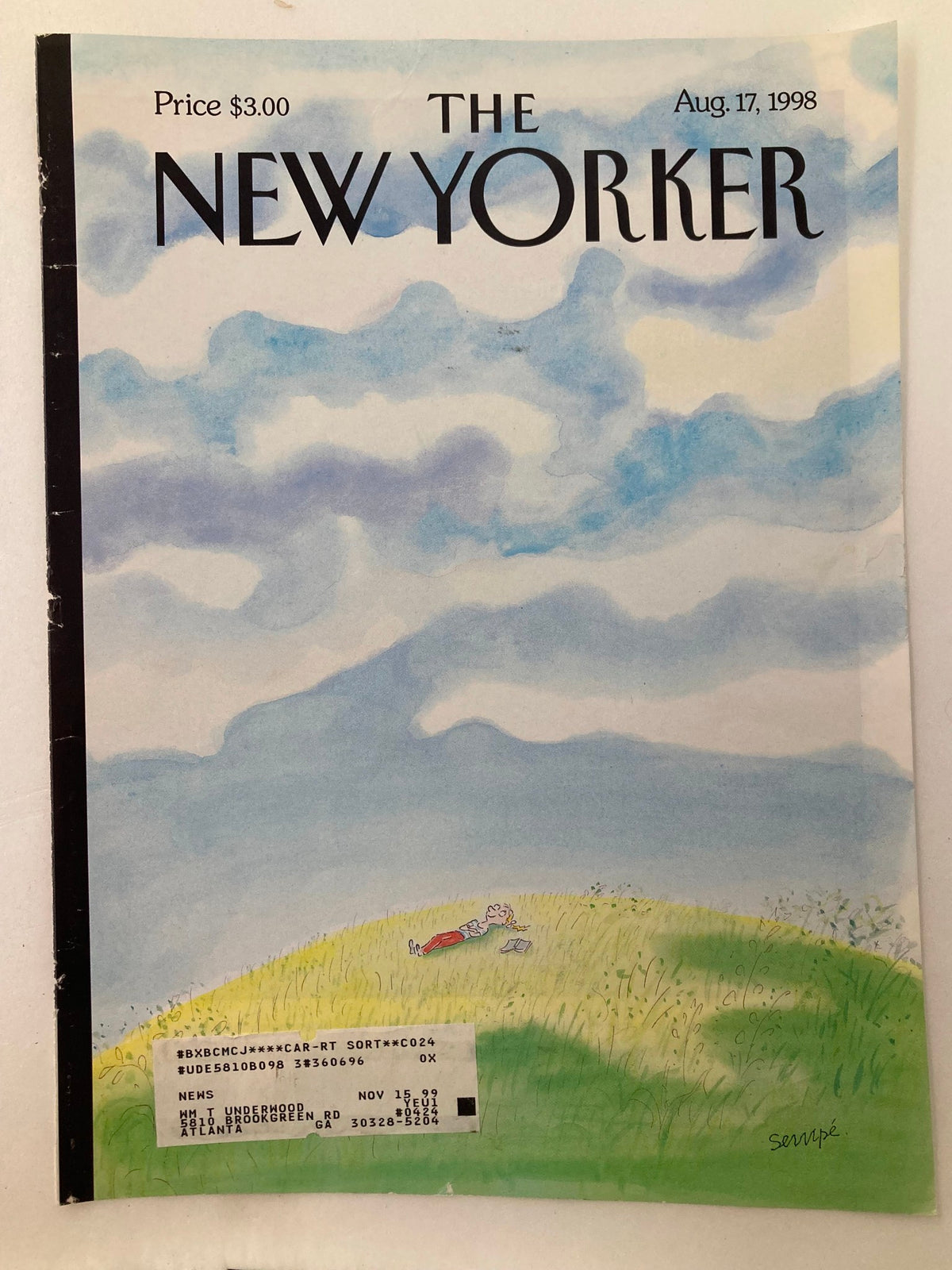 Cover art of The New Yorker from August 17, 1998, titled 'Afternoon Dream' by J. J. Sempe, showcasing a serene scene with a character lying in a field, surrounded by a scenic backdrop.