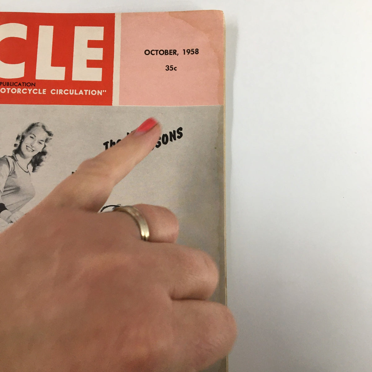 Close-up view of the top section of the VTG Cycle Magazine October 1958 cover, showcasing the publication date and price.