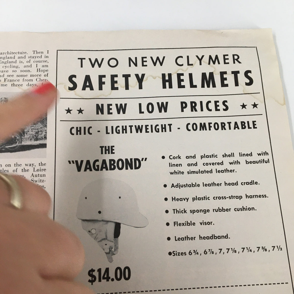 Advertisement page in VTG Cycle Magazine December 1958 highlighting new safety helmets with detailed descriptions and pricing, showcasing cycling accessories from the era.
