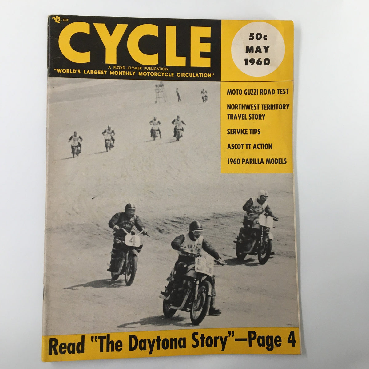 Cover of VTG Cycle Magazine May 1960 featuring the 1960 Daytona Beach National Events, showcasing motorcycle racers in action on the beach.