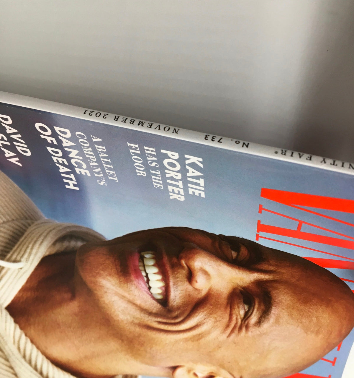 Vanity Fair Magazine November 2021 featuring Dwayne Johnson with a smiling close-up of his face, showcasing the captivating cover themes of celebrity culture and personal journey.