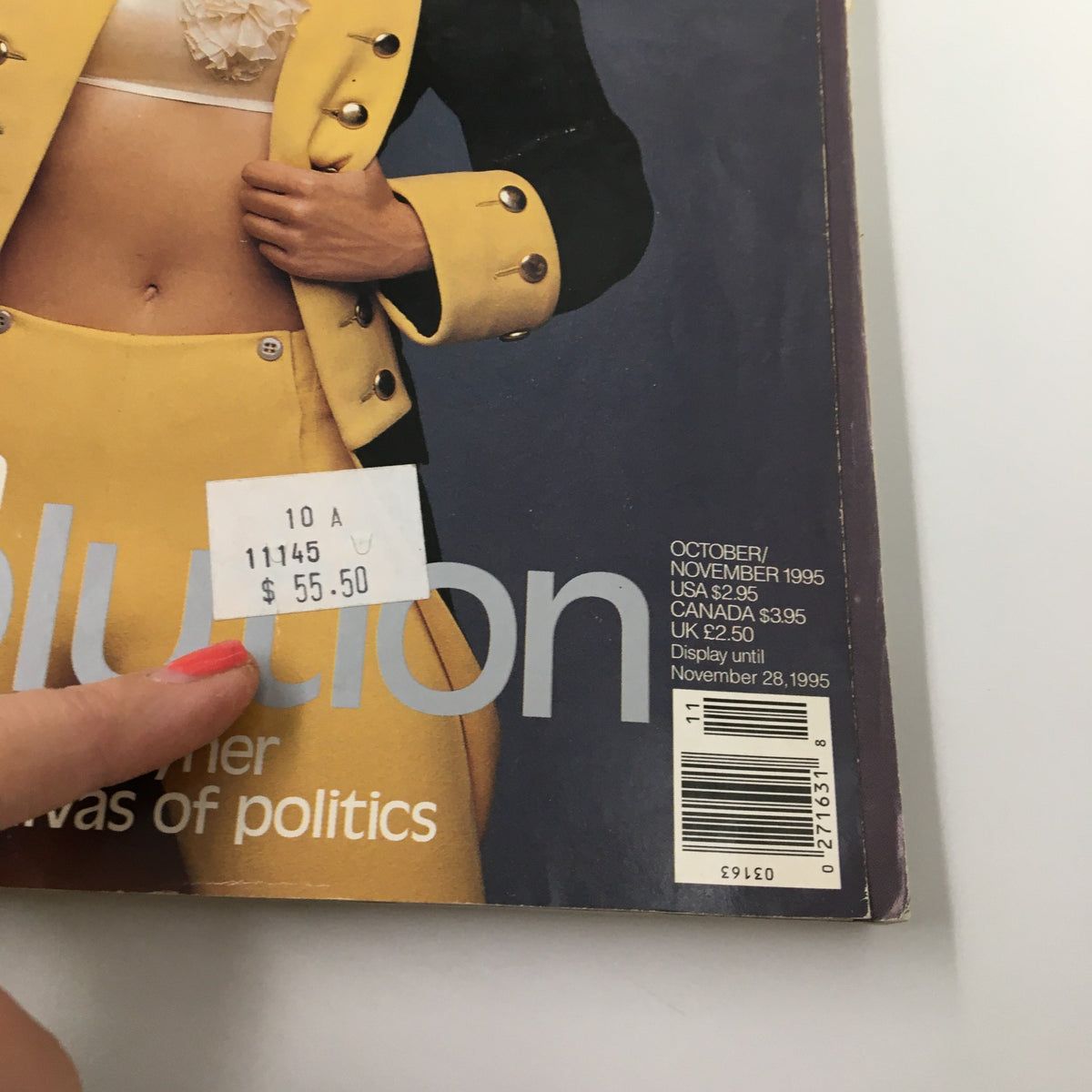 Cover of George Magazine October 1995 featuring an interview with John Kennedy, showing a vintage fashion model in a yellow outfit, highlighting the magazine's political theme and price display.