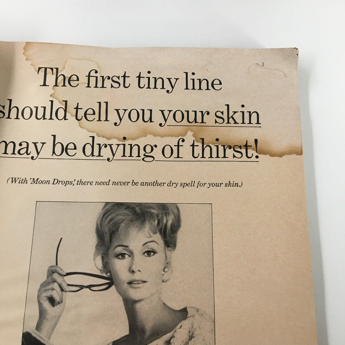 Vintage advertisement about skin care, presenting a model with a modern hairstyle and glasses, from The New Yorker Magazine September 26, 1964.