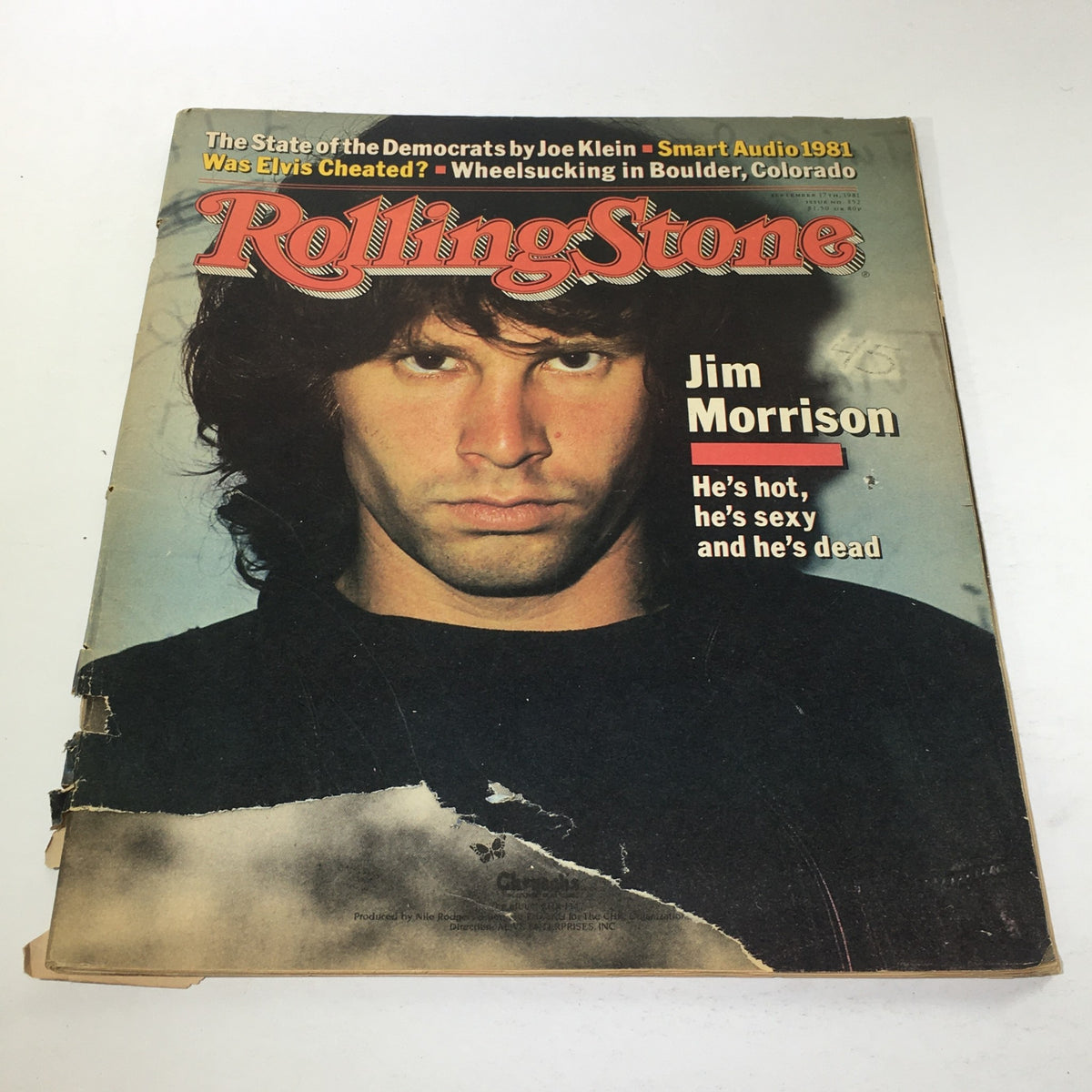 Vintage Rolling Stone magazine from September 17, 1981, featuring Jim Morrison on the cover. The magazine has visible wear and tear with edges frayed and a large rip on the front. It has a bold title stating 'Jim Morrison: He's hot, he's sexy, and he's dead.' The magazine is labeled as a no label/newsstand edition.