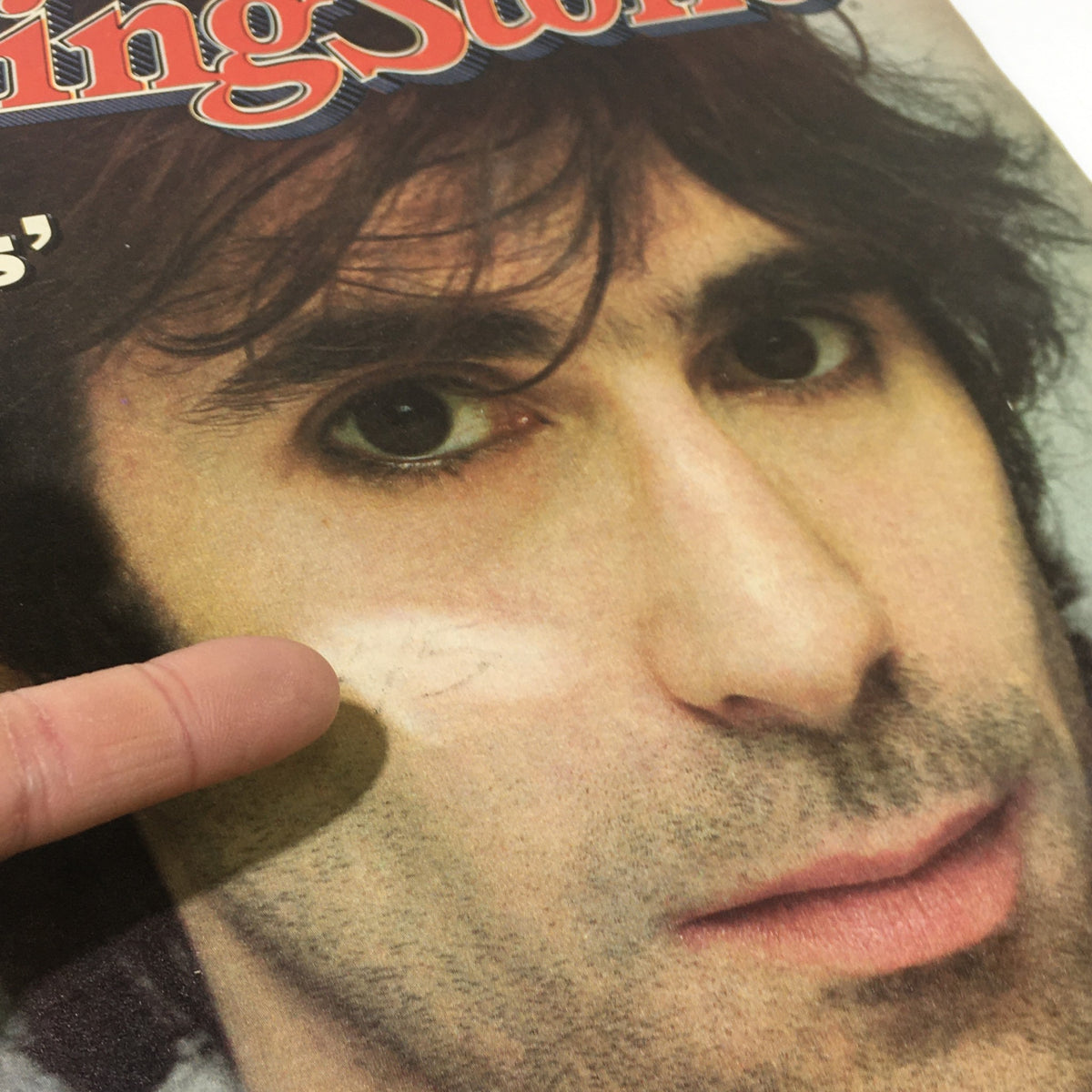 Close-up of the cover of Rolling Stone Magazine from March 4, 1982, highlighting Peter Wolf of the J. Geils Band with visible wear on the cover, emphasizing its vintage character.