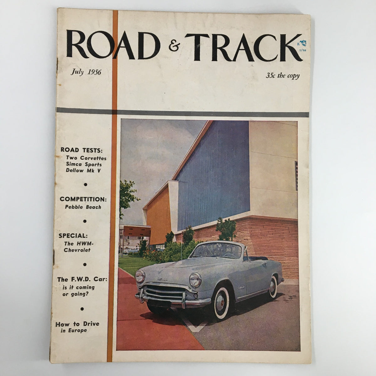 Cover of VTG Road & Track Magazine July 1956 featuring a vintage convertible car and an advertisement for road tests.