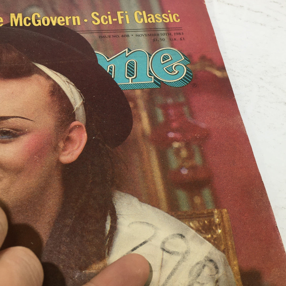 Close-up view of the cover of Vintage Rolling Stone Magazine: November 10, 1983 showcasing Boy George, with bold text indicating the issue number and date.