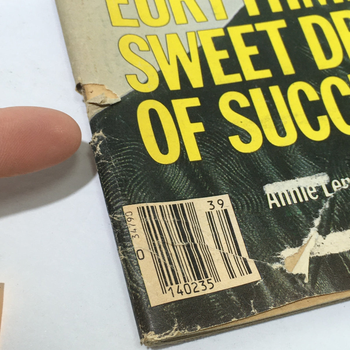 Close-up image of the barcode and minor damage on the back cover of VTG Rolling Stone: September 29 1983 - Annie Lennox Cover, showing details of wear and a printed address label.