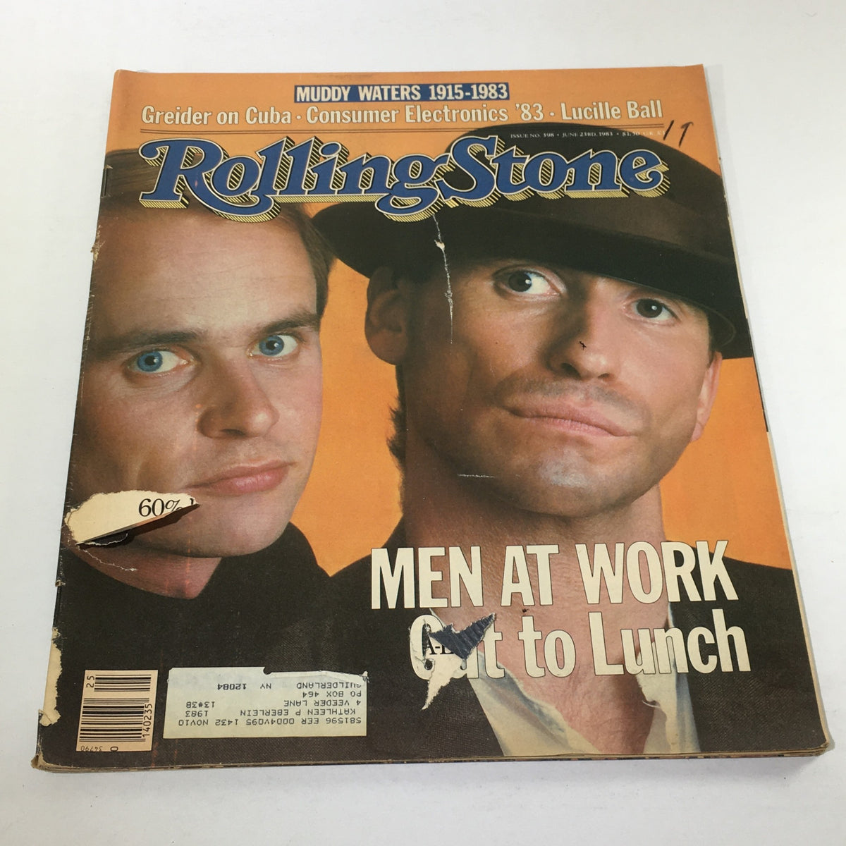 Vintage Rolling Stone magazine cover featuring Men At Work, dated June 23, 1983, with noticeable wear and tear including a large rip.