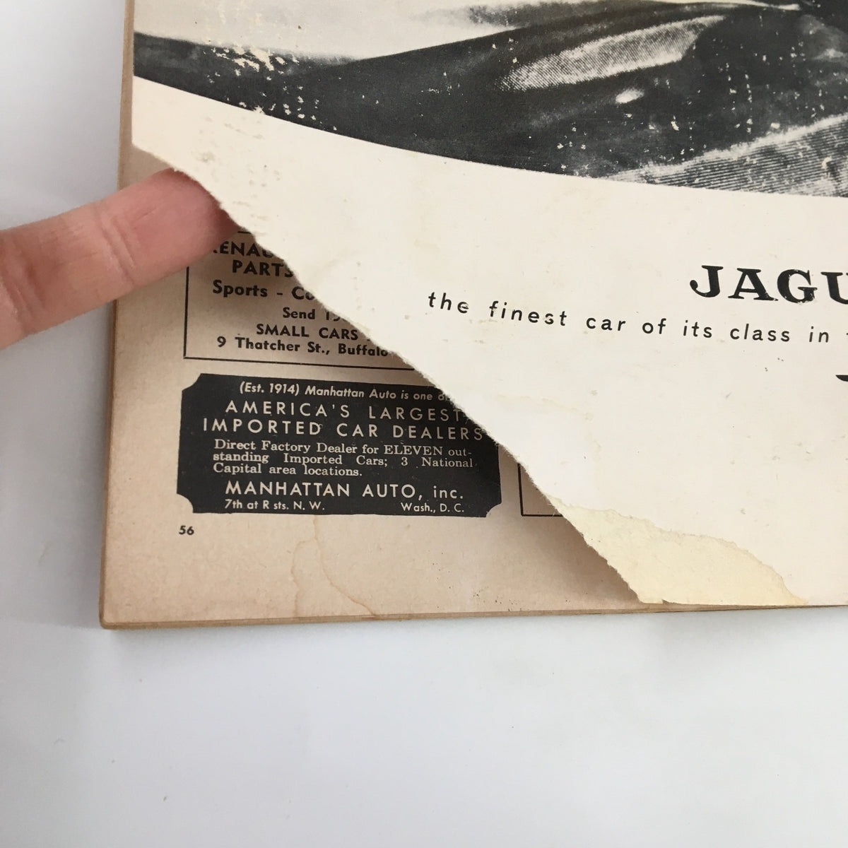 Back cover detail of VTG Road & Track Magazine February 1957 illustrating advertisements and features, highlighting the historical significance of automotive culture.