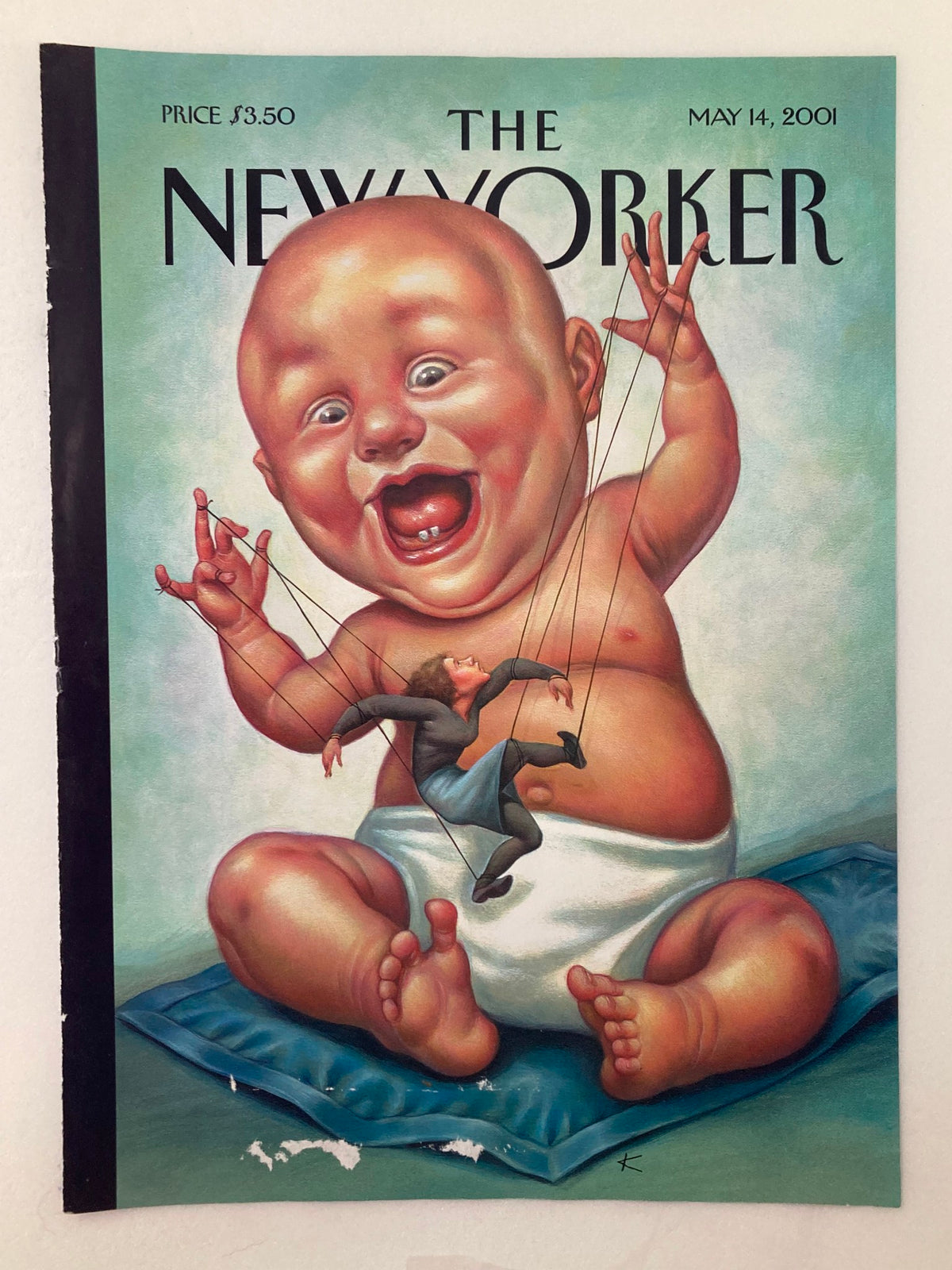 Cover of The New Yorker magazine from May 14, 2001, showcasing the 'Baby Puppetmaster' illustration by Anita Kunz, featuring a playful baby with puppet strings controlling a tiny figure.