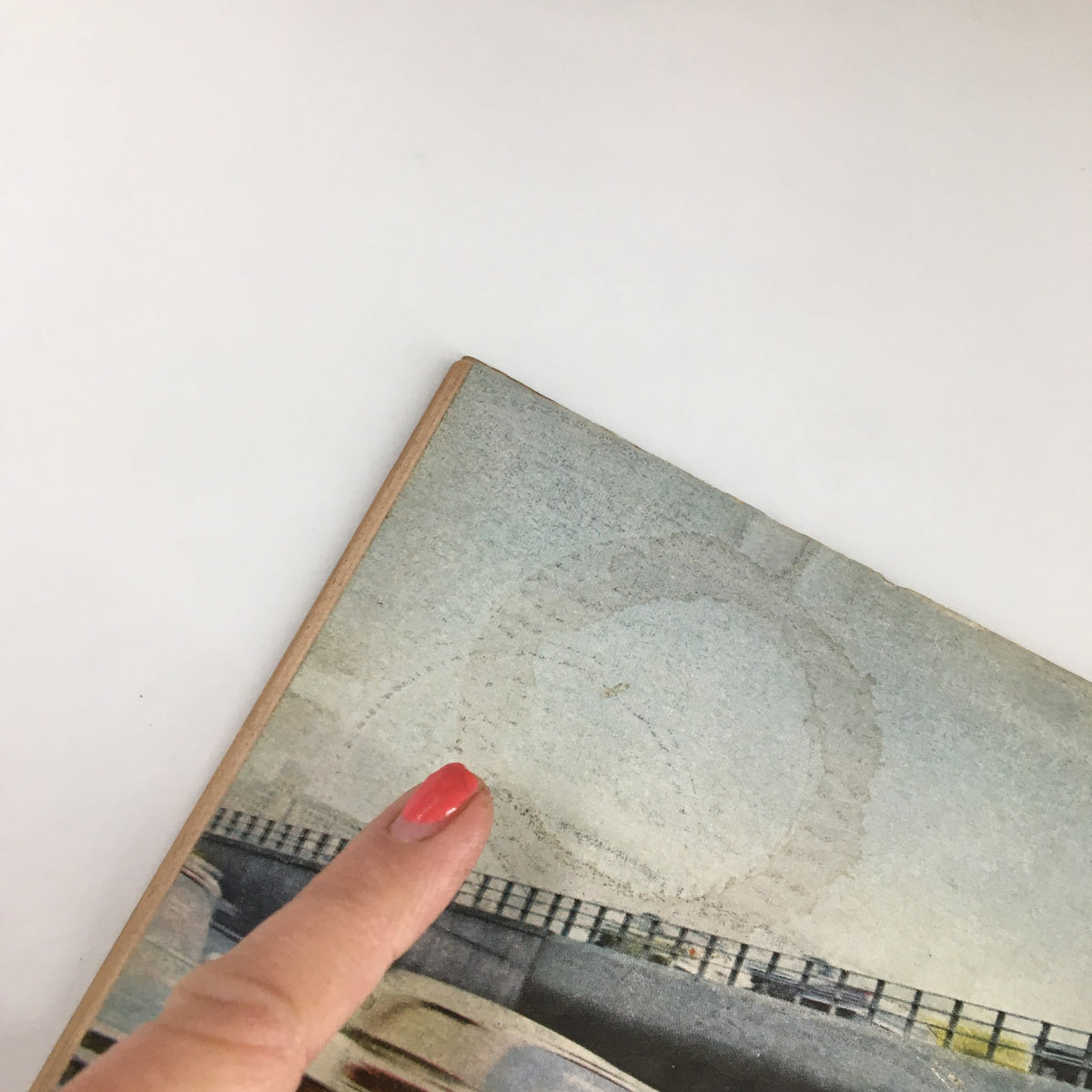 Close-up of the edge of the VTG Road & Track Magazine January 1959, highlighting minor wear and historical details.