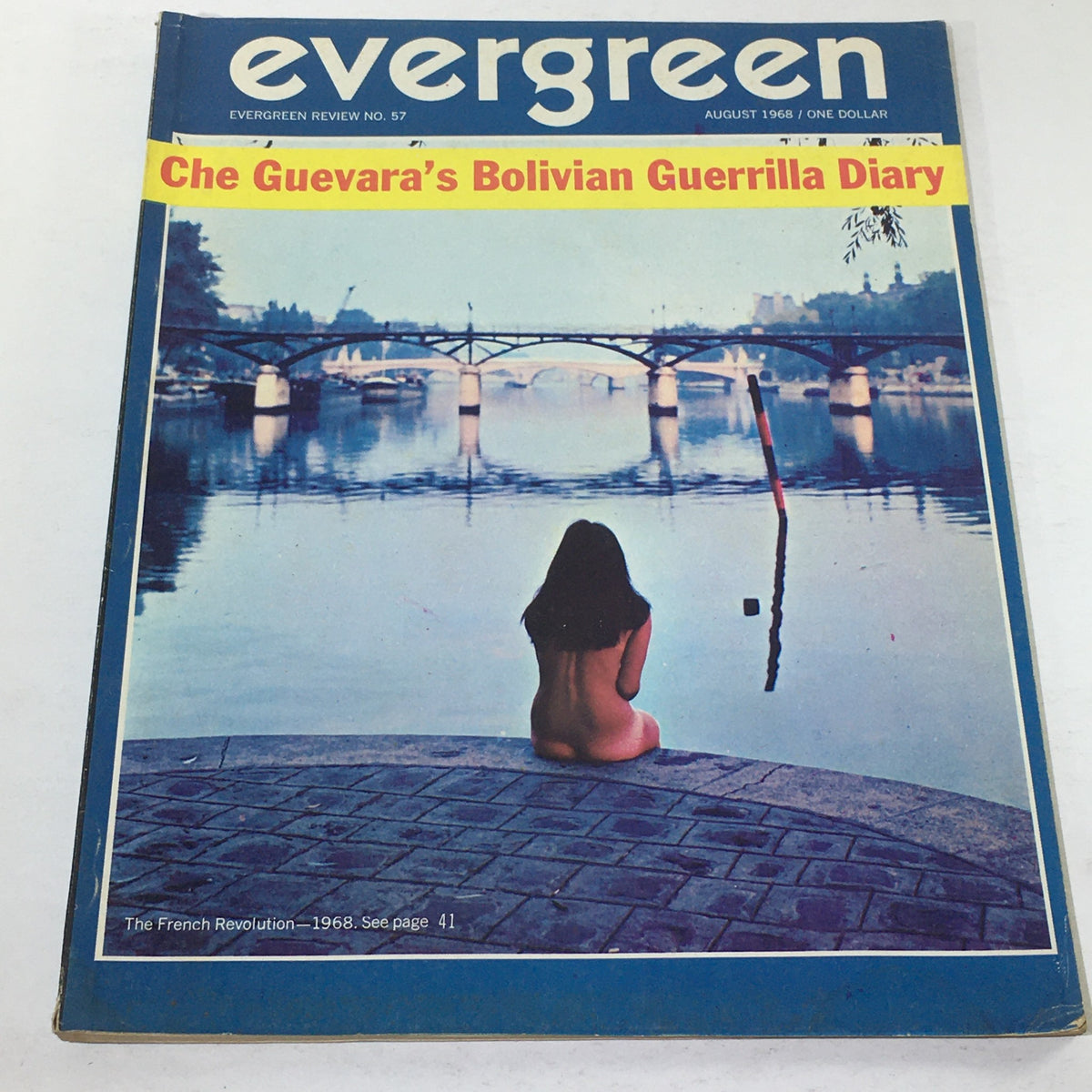Vintage Evergreen Magazine Cover: August 1968 featuring Che Guevara's Bolivian Guerilla Diary, showcasing a reflective scene with a figure by a riverbank.