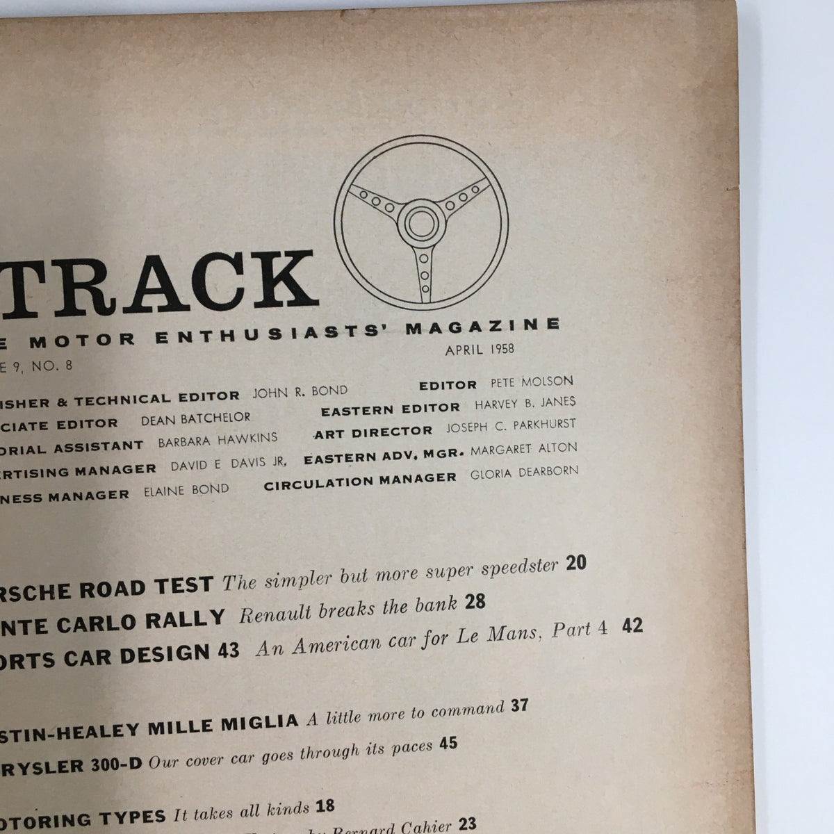 VTG Road & Track Magazine April 1958 cover featuring editorial details and a steering wheel graphic, showcasing the issue number and editorial staff.