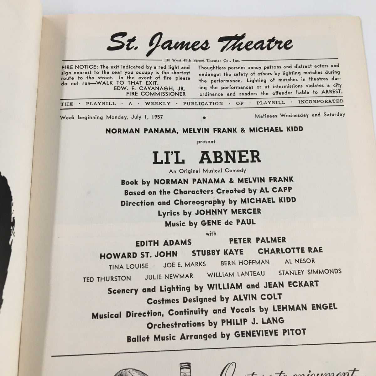 Inside of the 1957 Playbill from St. James Theatre for Li'L Abner, listing the cast and creative team including Norman Panama, Melvin Frank, and Michael Kidd.