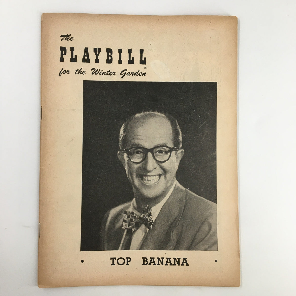 1951 Playbill featuring Philip Silvers in Top Banana at the Winter Garden Theatre, showcasing a smiling character on the cover.