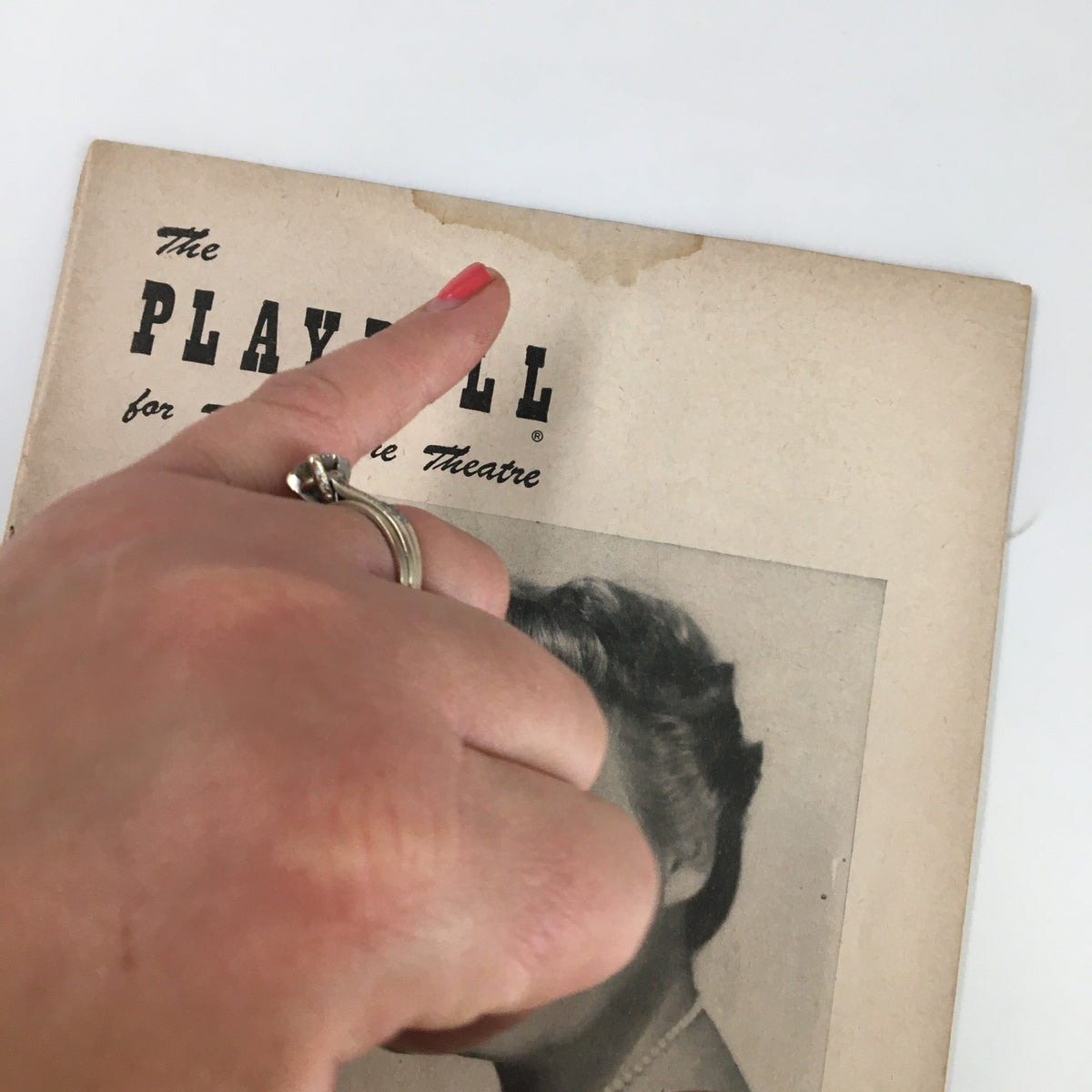 Close-up of the top of the 1952 Playbill for The Empire Theatre featuring Shirley Booth in The Time of The Cuckoo, highlighting minor wear and an elegant vintage appearance.