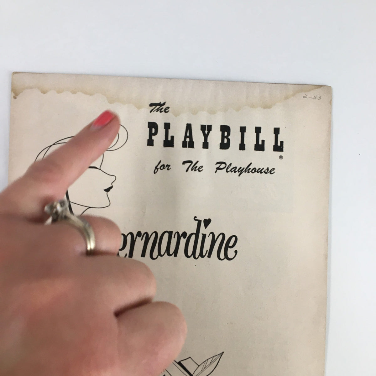 1953 Playbill for The Playhouse featuring 'Bernardine' by Mary Chase, showing a partially damaged cover with elegant typography.