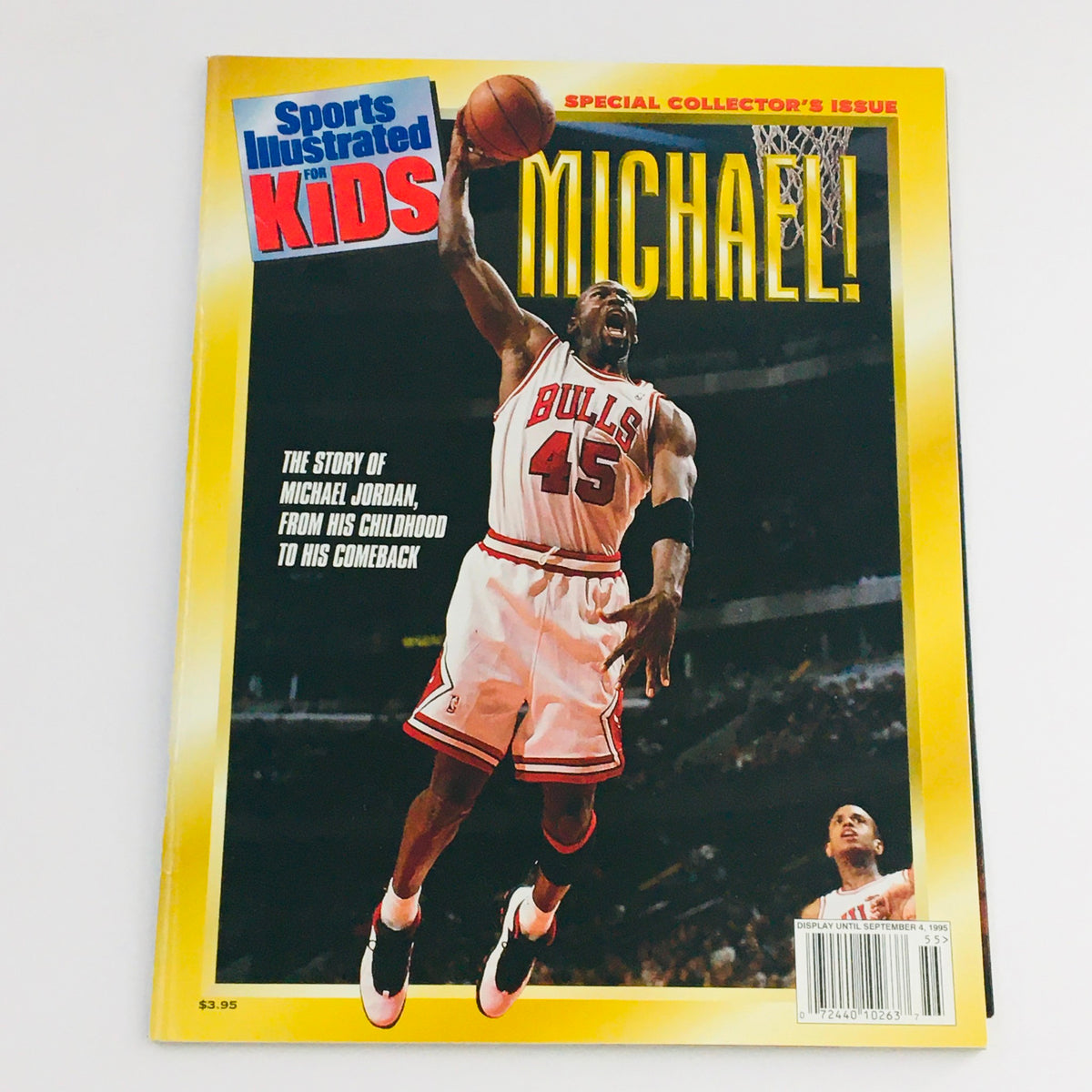 Cover of Sports Illustrated for Kids Magazine 1995 featuring Michael Jordan. The cover highlights Michael Jordan's story from childhood to his comeback, showcasing him in action wearing a Chicago Bulls jersey. This special collector's issue includes a vibrant design that celebrates the legendary basketball player's impact on sports culture.