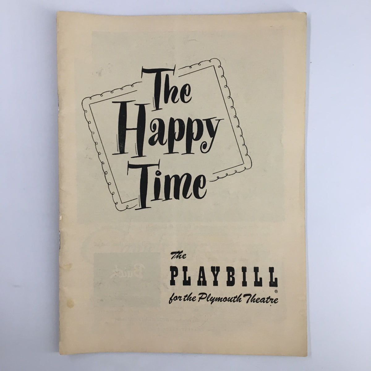 Cover of the 1950 Playbill for The Happy Time at The Plymouth Theatre featuring classic typography and design.