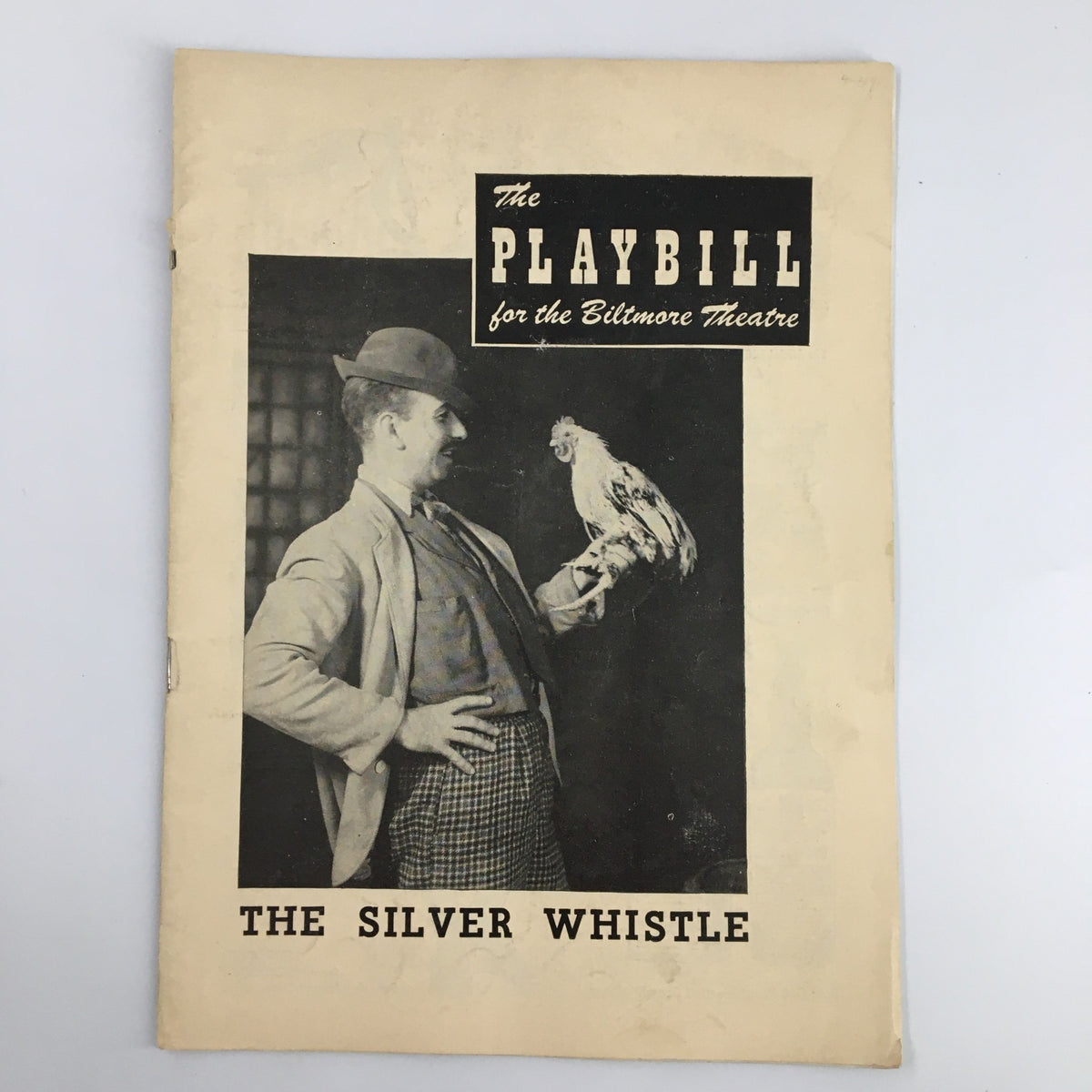 1949 Playbill Biltmore Theatre for The Silver Whistle featuring a performer with a bird on stage.