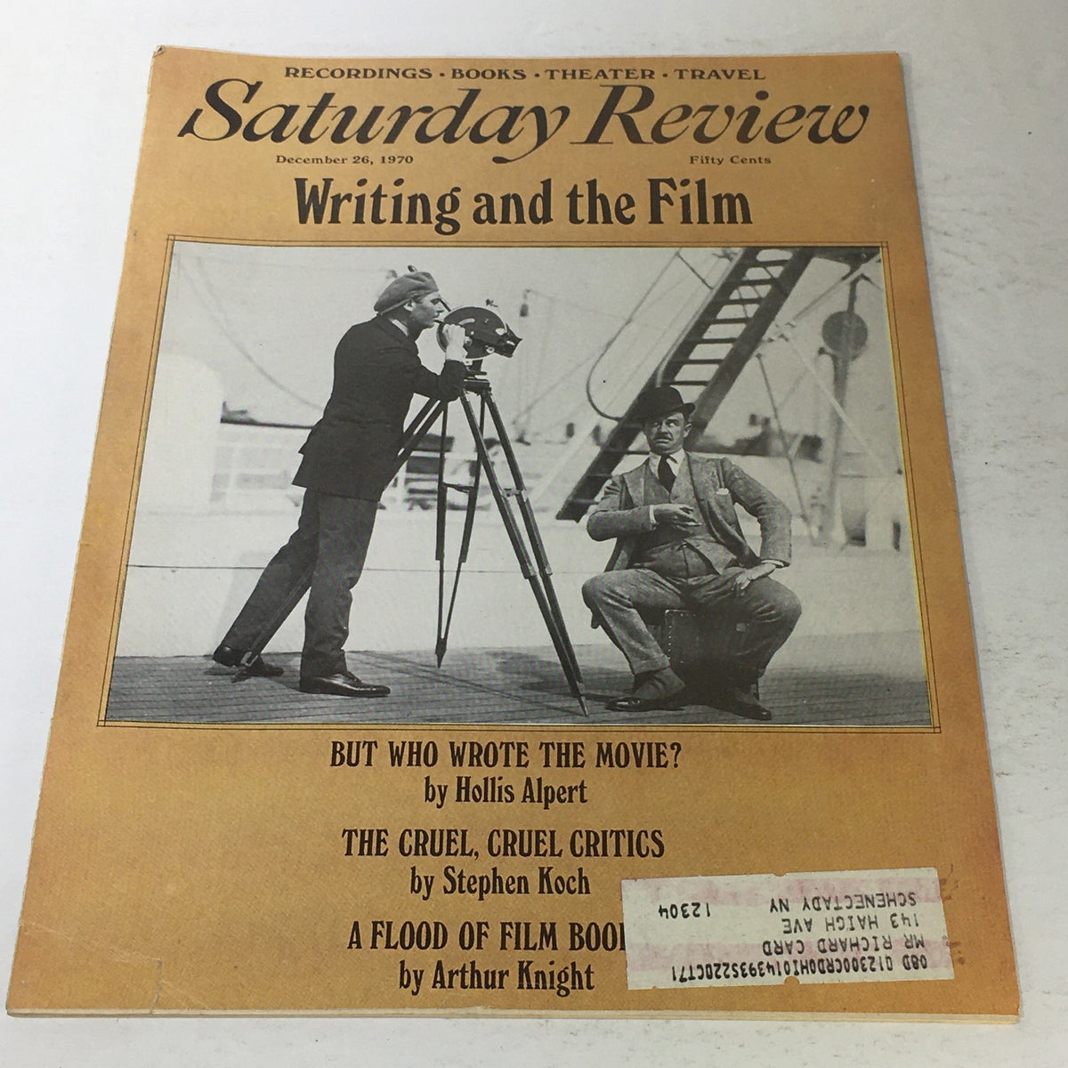 VTG Saturday Review: December 26 1970 - Writing and the Film by Charlie Chaplin featuring a vintage magazine cover with a photograph of a filmmaker and camera. The cover includes articles titled 'But Who Wrote the Movie?' and 'The Cruel, Cruel Critics'.