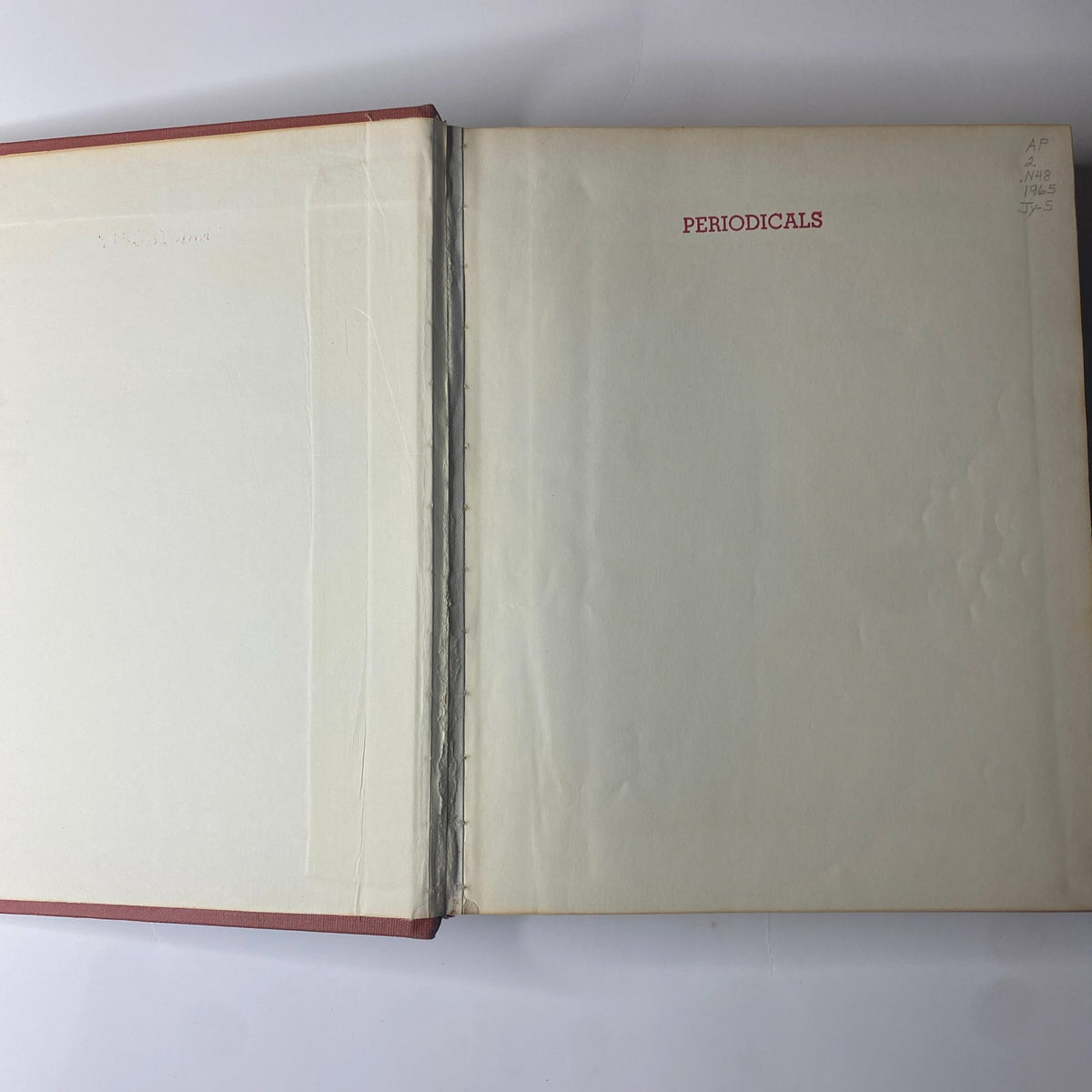 Inside view showcasing the spine of The New York Times Library Edition Bound Magazine 1965 July - September, featuring the title 'PERIODICALS' on the first blank page.