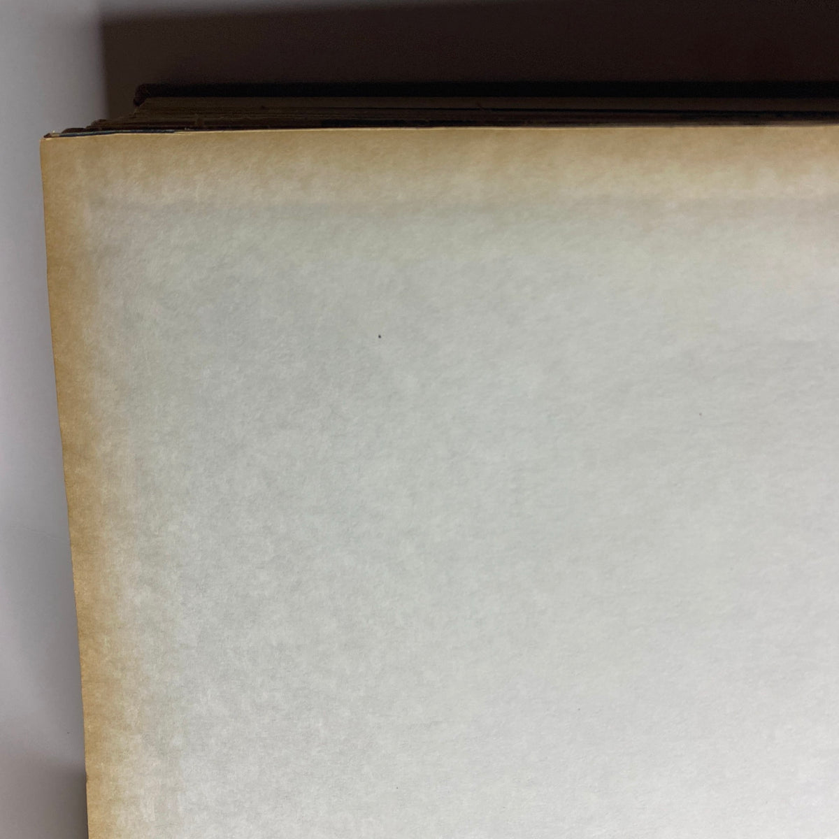 Top view of the spine of 'The New York Times Library Edition Bound Magazine 1968 May - June', showcasing its unique binding and condition.