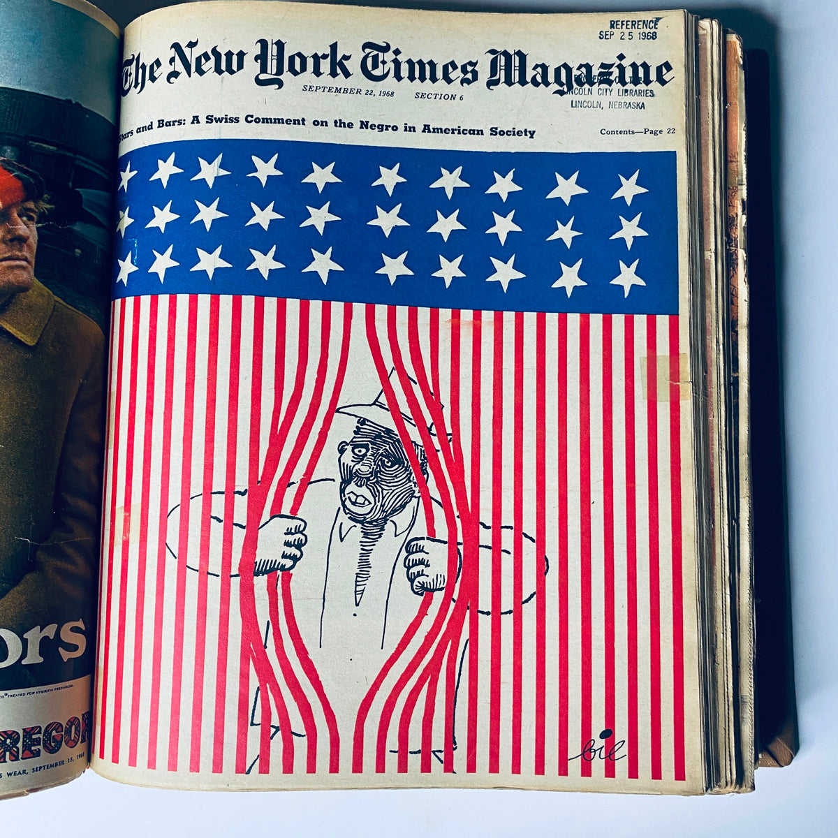 Cover of The New York Times Magazine from September 22, 1968, featuring a striking design with a red and white striped background and a figure pushing through the stripes, symbolizing themes of civil rights and social commentary.