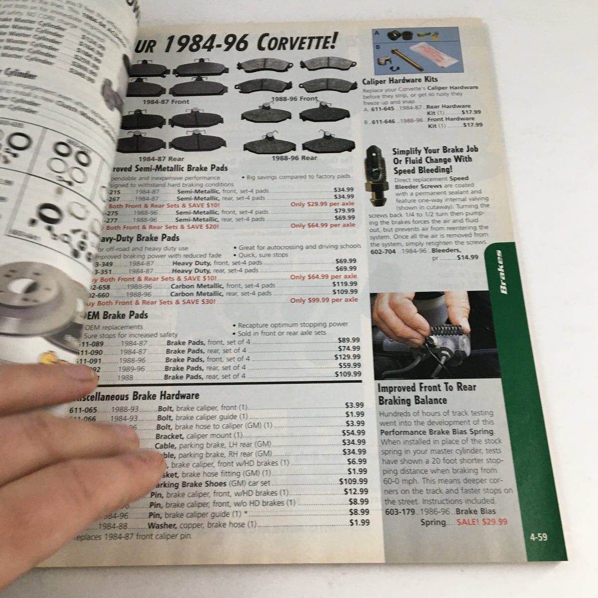 Interior page of the Mid America Motorworks Corvette 1993 Parts & Accessories Catalog listing brake pads and car maintenance tools.