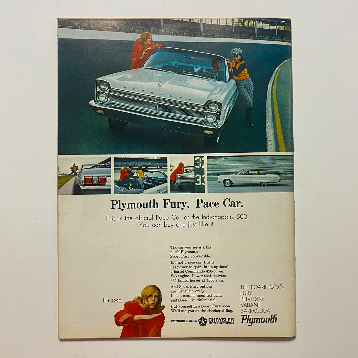 Advertisement page from VTG Car Life Magazine May 1965 featuring Plymouth Fury, the official Pace Car of the Indianapolis 500.