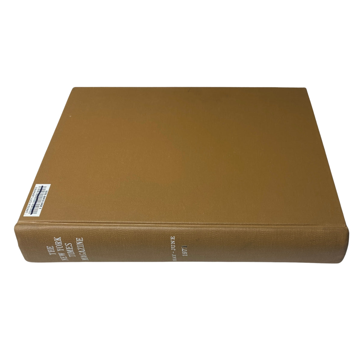 Side view of The New York Times Library Edition Bound Magazine 1971 May - June, highlighting the title on the spine and the library identification label.