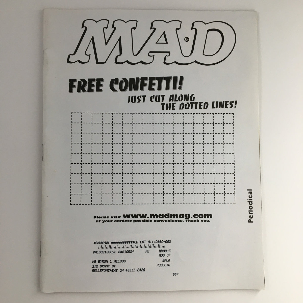 Back cover of Mad Magazine August 2004 #444 with a 'Free Confetti' promotion and dotted lines for cutting, maintaining the classic Mad Magazine aesthetic.