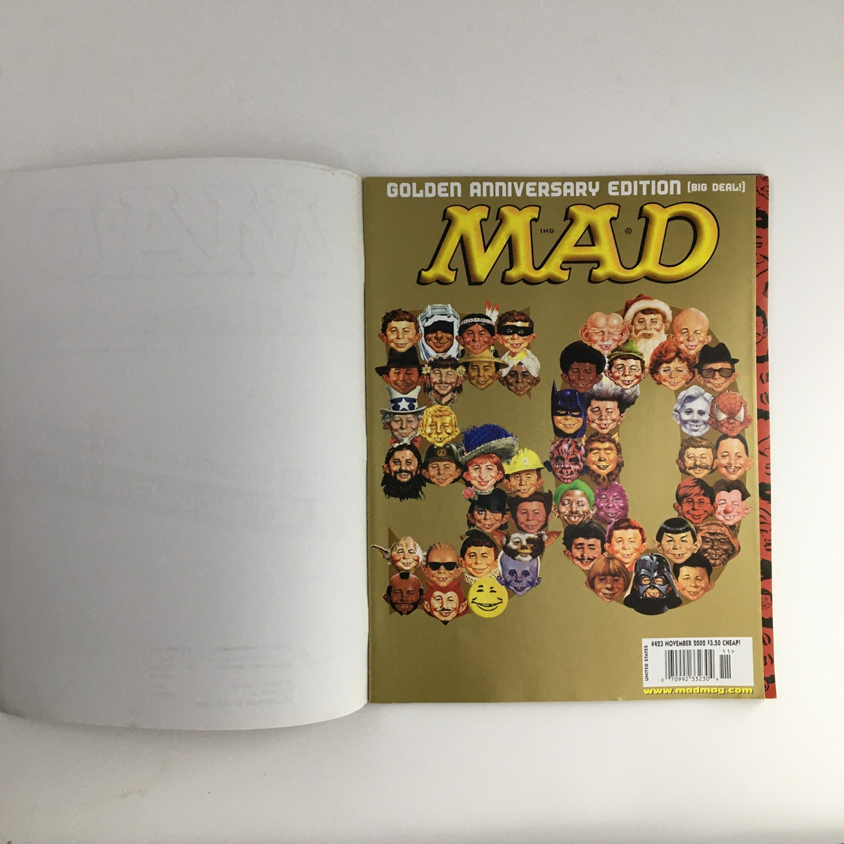 Mad Magazine November 2002 #423 Golden Anniversary Edition cover featuring a colorful collage of caricatures symbolizing its 50th anniversary in humor and satire, highlighting the magazine's iconic style.
