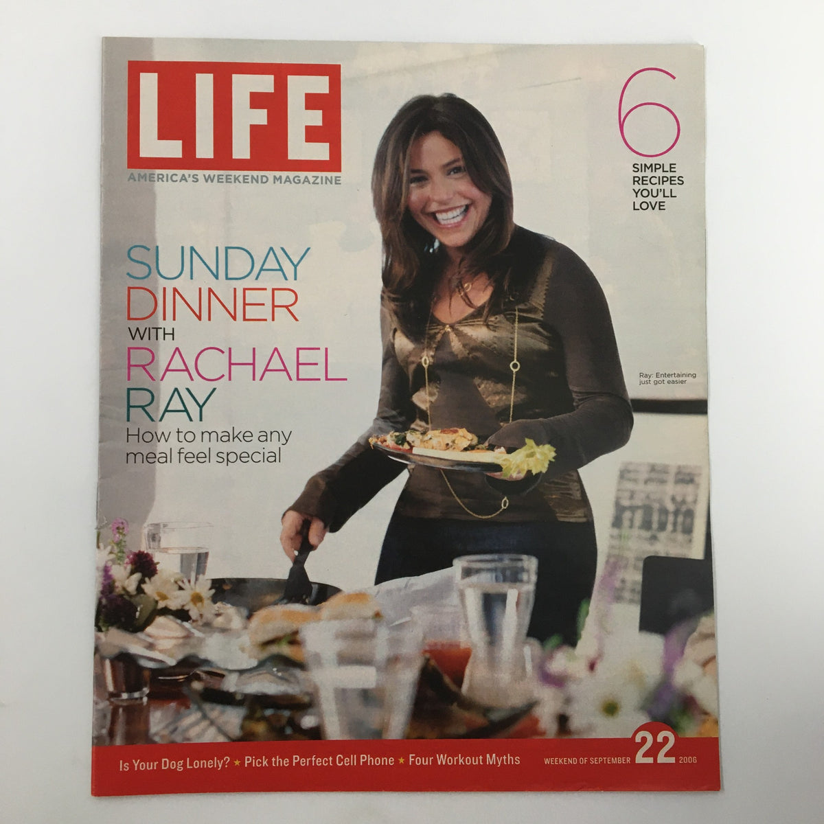 Life Magazine Newspaper Insert featuring Rachael Ray, dated September 22, 2006. This vibrant cover highlights Rachael Ray in a stylish outfit, showcasing a Sunday dinner scene, ideal for collectors of vintage magazines.