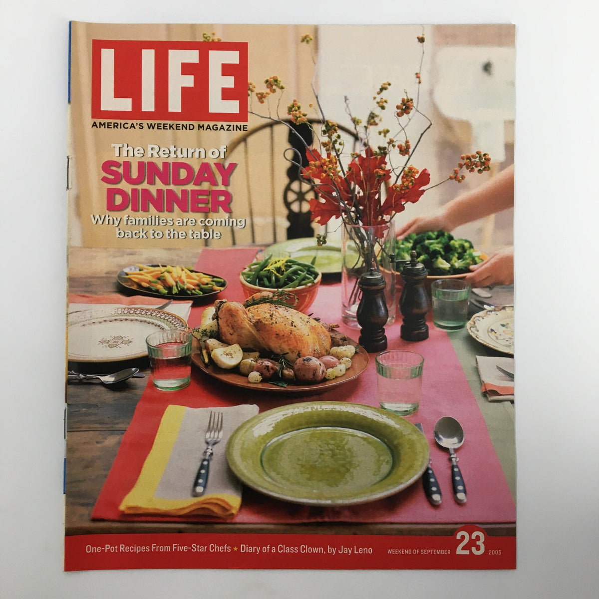 Life Magazine Newspaper Insert titled 'The Return of Sunday Dinner' from September 23, 2005, featuring a beautifully set dining table with a festive meal, showcasing recipes and articles on family gatherings.