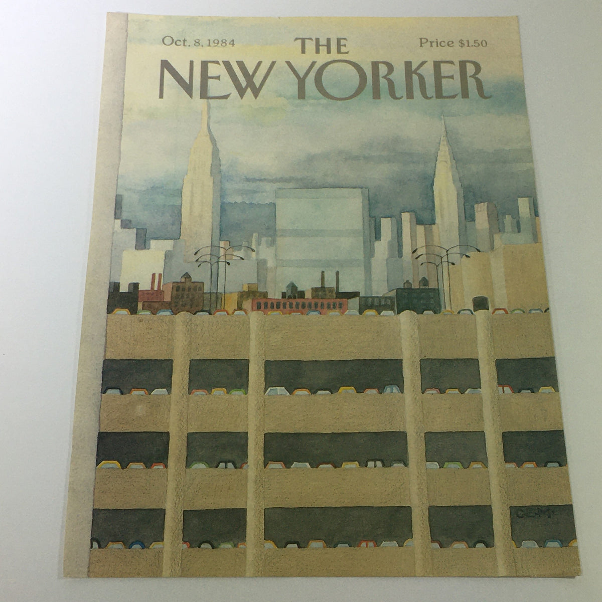 Cover of The New Yorker Magazine dated October 8, 1984, featuring an artistic cityscape with the Empire State Building and a parking garage, designed by Charles E. Martin.