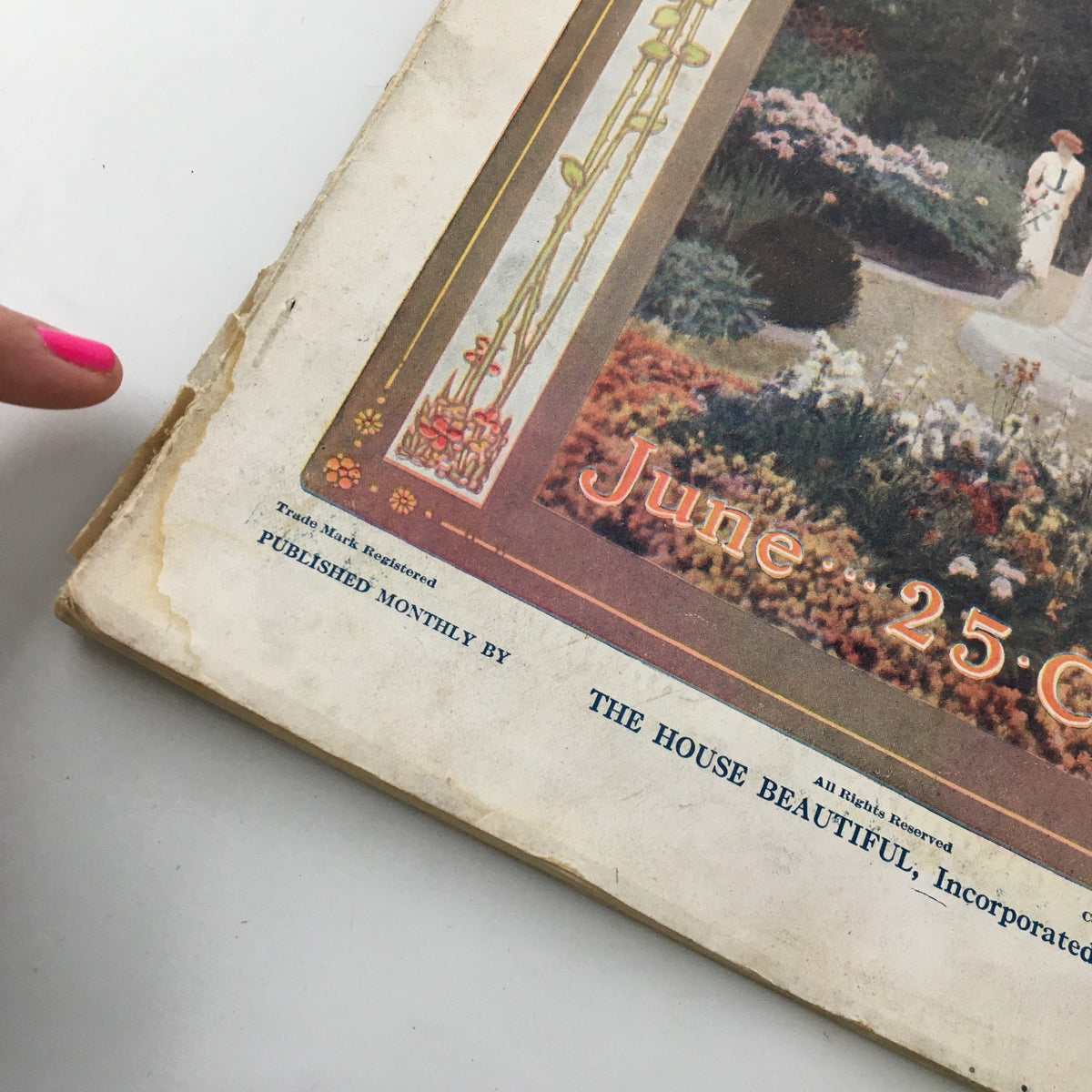 Detailed view of The House Beautiful Magazine June 1912 corner with publication information, showcasing its historical significance.